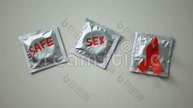 安全套、艾滋病和艾滋病毒预防运动上的安全词汇和红丝带